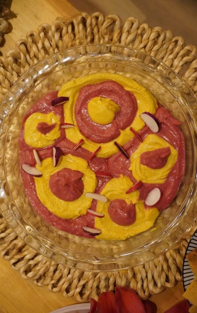 Platter of citrus and vegetable carpaccio arranged in a circle