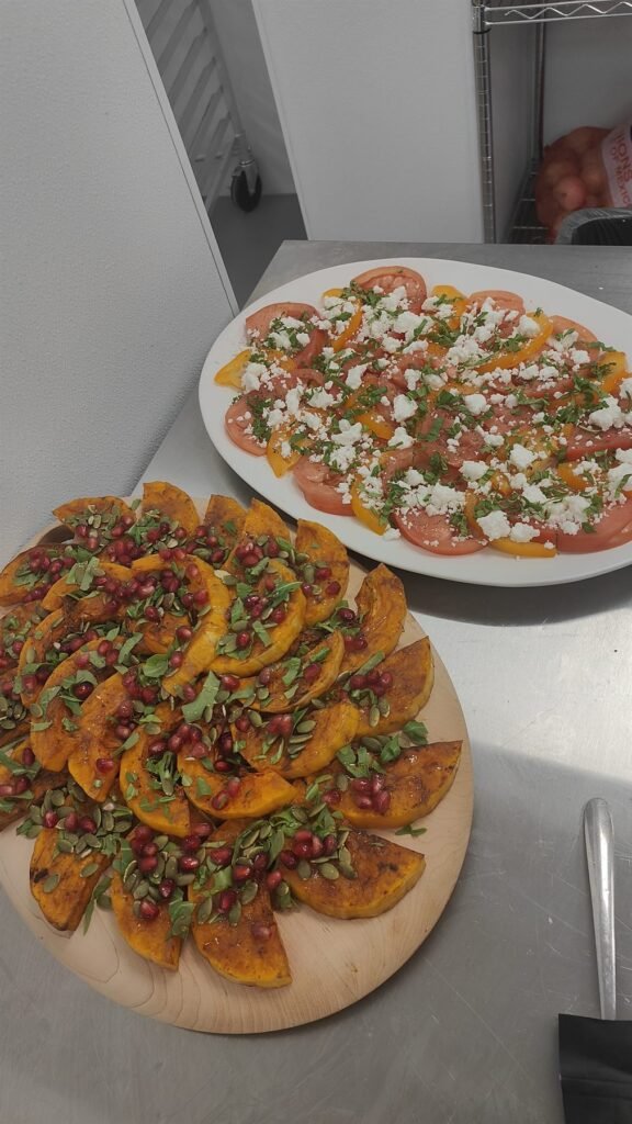 Filo pastry cups filled with herbed salad and garnished with mint