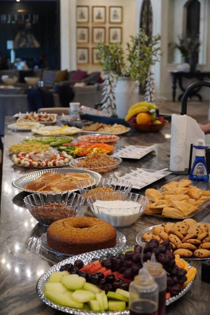 Grazing platter of fresh fruit, pastries and baked goods