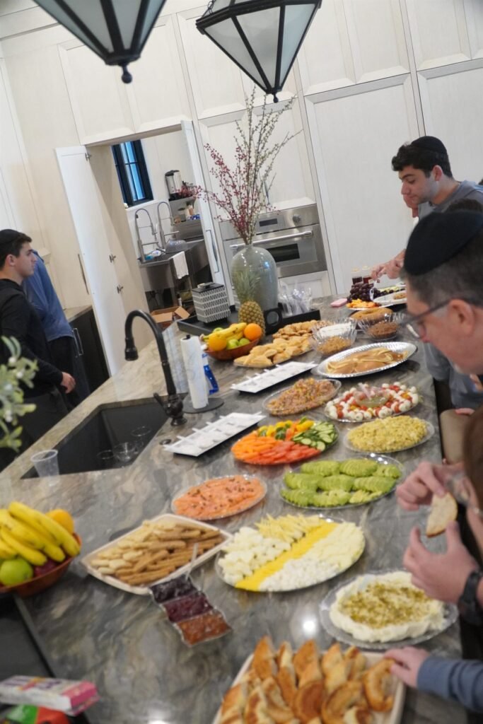 Grazing table laid out along a kitchen counter for a private event