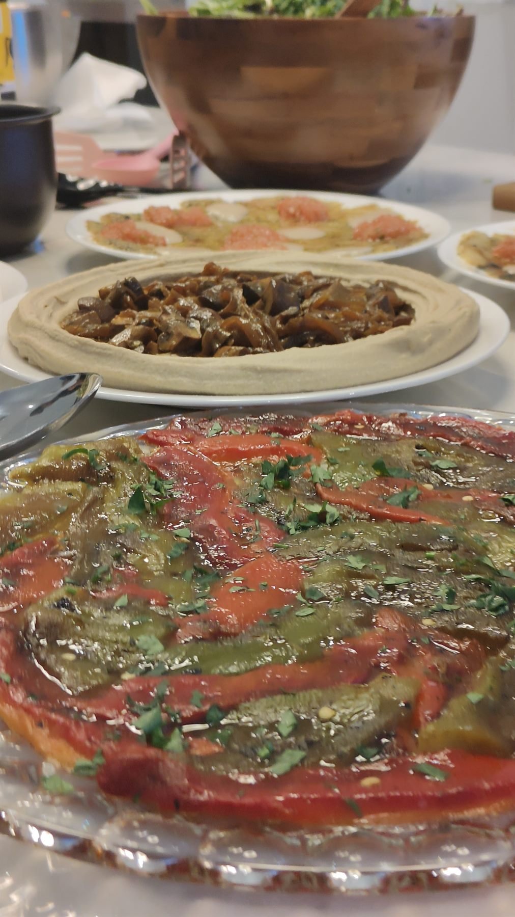 Mezze table with dips, salads, breads and marinated vegetables