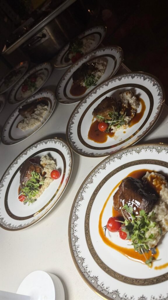 Small tasting plates arranged on patterned dinnerware